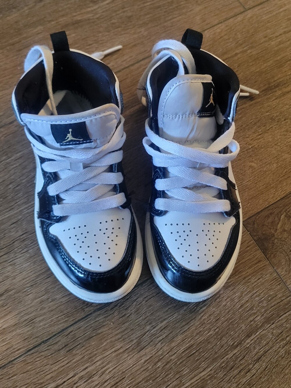 Jordan Kids High-Top Sneakers in White and Black